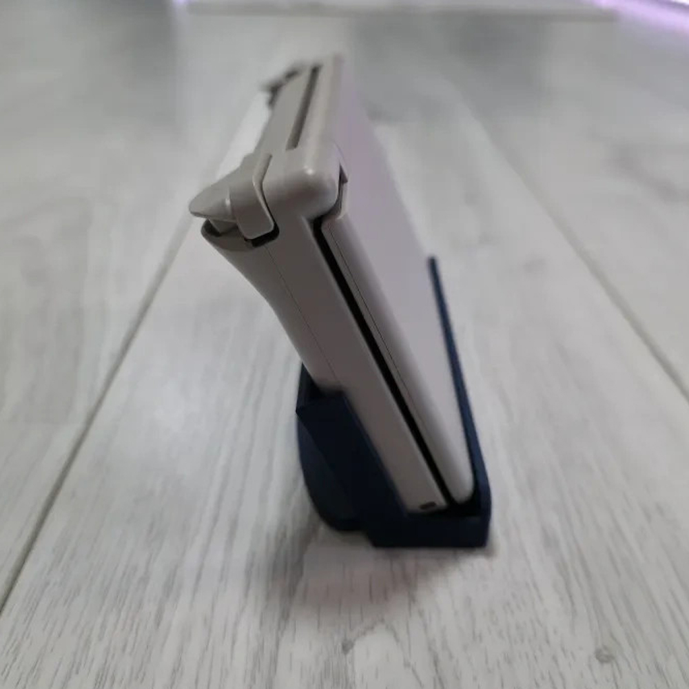 حامل مكتبي عمودي محمول لجهاز أ - مراجعة Gaming Console Holder وسعره